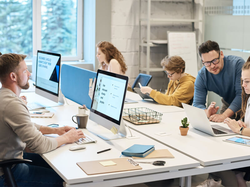 real software team working together in an office