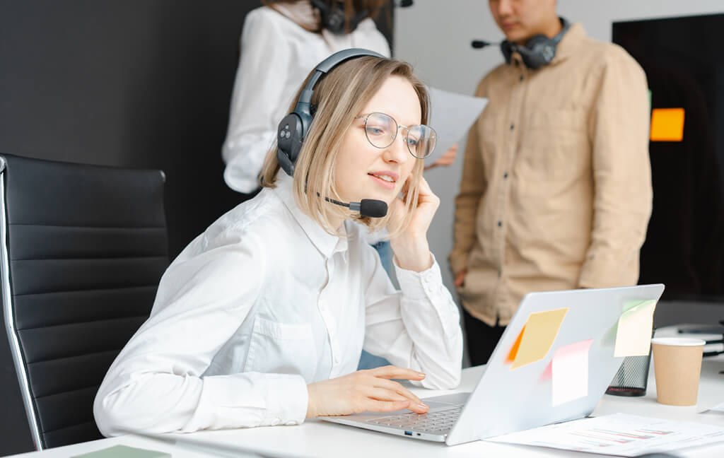 real support professional using a laptop for client software work